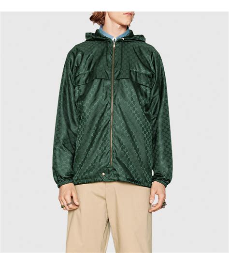 black gucci windbreaker jacket with green accents|Gucci jacquard puffer jacket.